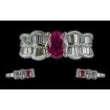 Platinum Quality & Contemporary Designed Diamond & Ruby Set Dress Ring, marked 900. The central