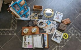 Two Boxes of Collectibles, including a porthole mirror, pictures, antique headphones, wooden box,