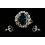 Ladies 18ct Gold Attractive Sapphire and Diamond Set Cluster Ring. Marked 18ct to Interior of Shank.