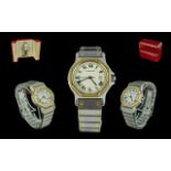 Cartier Santos Ladies Supreme Quality 18ct gold & steel Automatic watch. Serial number 296639681