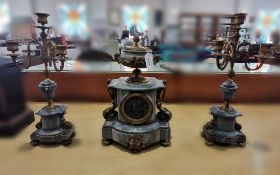 Marble Garniture Set, grey with decorative brass designs, comprising a clock with intricate brass