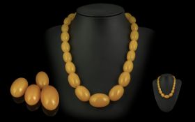 Excellent Quality - Rich Yellow Amber Graduated Beaded Necklace with Large Matching Rich Yellow