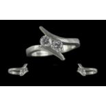 Ladies Contemporary Designed 18ct White Gold Two Stone Diamond Set Ring. Marked 750 to interior of
