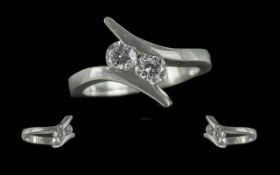 Ladies Contemporary Designed 18ct White Gold Two Stone Diamond Set Ring. Marked 750 to interior of