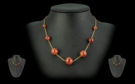 Ladies 9ct Gold Pleasing Amber Bead Graduated Necklace, Marked 9ct. Excellent Colour, c.1950's.
