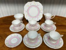 Royal Stafford Bone China Tea Set, comprising sugar bowl, milk jug, five cups and six saucers,