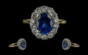 18ct Gold - Superior Quality Blue Sapphire and Diamond Set Ring. Flower head Setting. Full