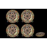 Royal Crown Derby Plates, pattern No.1128 'Imari' pattern, four in total, 7'' diameter.