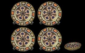 Royal Crown Derby Plates, pattern No.1128 'Imari' pattern, four in total, 7'' diameter.