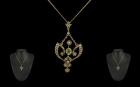 Victorian Period 9ct Gold Peridot / Seed Pearl Set Open Worked Pendant with Attached 9ct Gold Chain.