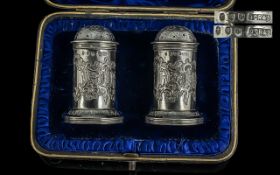 Scottish Interest - Boxed Pair of Sterling Silver Pepperettes, with serpent embossed decoration .