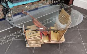 Modern Coffee Table, musical interest, depicting books and violin supporting top. Height 19'', width
