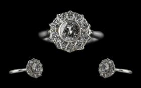 Platinum Superb Quality Ladies Diamond Set Dress Ring, the central round modern brilliant cut