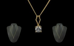 18ct Gold - Single Stone Diamond Set Drop - Attached to a 18ct Gold Chain. Marked 18ct. The Single