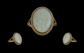 Ladies 9ct Gold Pleasing Single Stone Opal Set Ring. Full Hallmark to Shank. The Oval Shaped Opal of