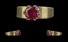 18ct Gold - Pleasing Quality Single Stone Ruby Band Ring. Marked 18ct - 750. The Faceted Ruby of