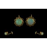 18ct Gold - Attractive Pair of Opal Set Earrings. Marked 18ct. The Round Opals of Excellent