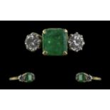 Ladies 18ct Gold Attractive 3 Stone Emerald and Diamond Set Dress Ring. Marked 18ct to Shank.
