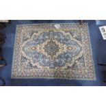 Large Wool Rug, blue with traditional pattern with central design. Rug measures 66'' x 93'' approx.