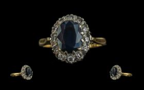 Ladies - 18ct Gold Pleasing Sapphire and Diamond Set Ring, Flower head Setting. Marked 18ct to