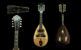 A Neopolitan Eight Strings Italian Bowl Back Mandolin by Luigi Poppi, circa 1900. Label to interior,