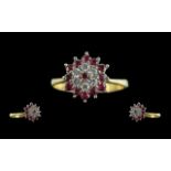An 18ct Gold Ruby & Diamond Ring, the ce