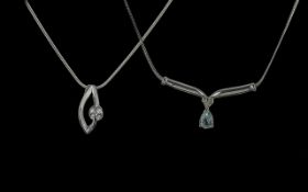 Two 9ct White Gold Chains & Pendants, on