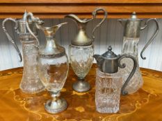 Four Quality Italian Glass Decanters, various styles, two x 12" tall and 2 x 11" tall,