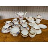 Minton's Tea Set, comprising a tea pot, coffee pot/hot water jug, milk jug, sugar bowl, two cups,