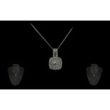 18ct White Gold Attractive Diamond Set Pendant, marked 750 - 18ct, with attached gold chain.