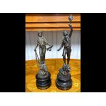 Two Bronzed Spelter Figures 'Le Travail' and 'La Force', measure approx. 14" high.