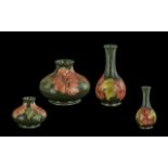 Two Small Moorcroft Vases, Coral Hibiscus Pattern, comprising a bud vase 6.