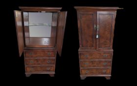 Cocktail Cabinet, mahogany, two doors open to reveal inner glass shelf,