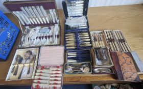 A Large Collection of Silver Plated Ware, comprising assorted flatware, serving spoons, servers,