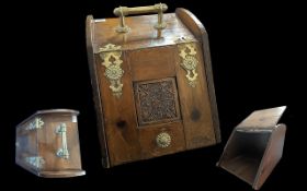 Wooden Coal Scuttle with Brass Mounts, hinged fall front with carved panel.