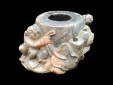 An Oriental 19thC Hardstone Carved Inkwell depicting figures in foliage,