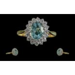 Ladies 18ct Gold Excellent Quality Aquamarine and Diamond Set Cluster Ring. Flower head Design.