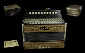 Hohner Squeeze Box Model 1140, in original box, black and gold colourway, with booklet.