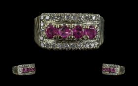 A 14 Carat Gold Diamond And Ruby Ring four round brilliant cut rubies approx 4.