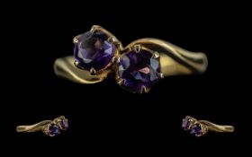 Ladies 18ct Gold Attractive Two Stone Amethyst Set Ring, full hallmark for 18ct to shank.
