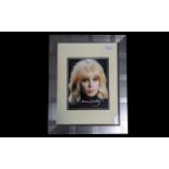 Signed Photograph of Joanna Lumley, in the Avengers period, mounted, framed and glazed,