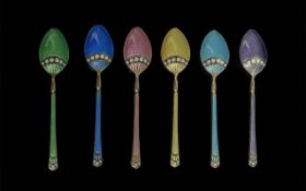 A Set of Six Silver Enamelled Tea Spoons, and matching Cake Knives, enamelled in pastel colours,