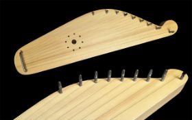 Russian Psaltery 9 String Lebedushki, light wood, in case, excellent condition.