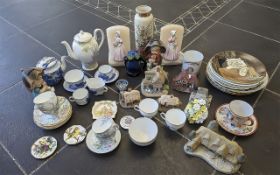 Box of Assorted Pottery & Porcelain, including teapot and cups and saucers, figures, bookends,