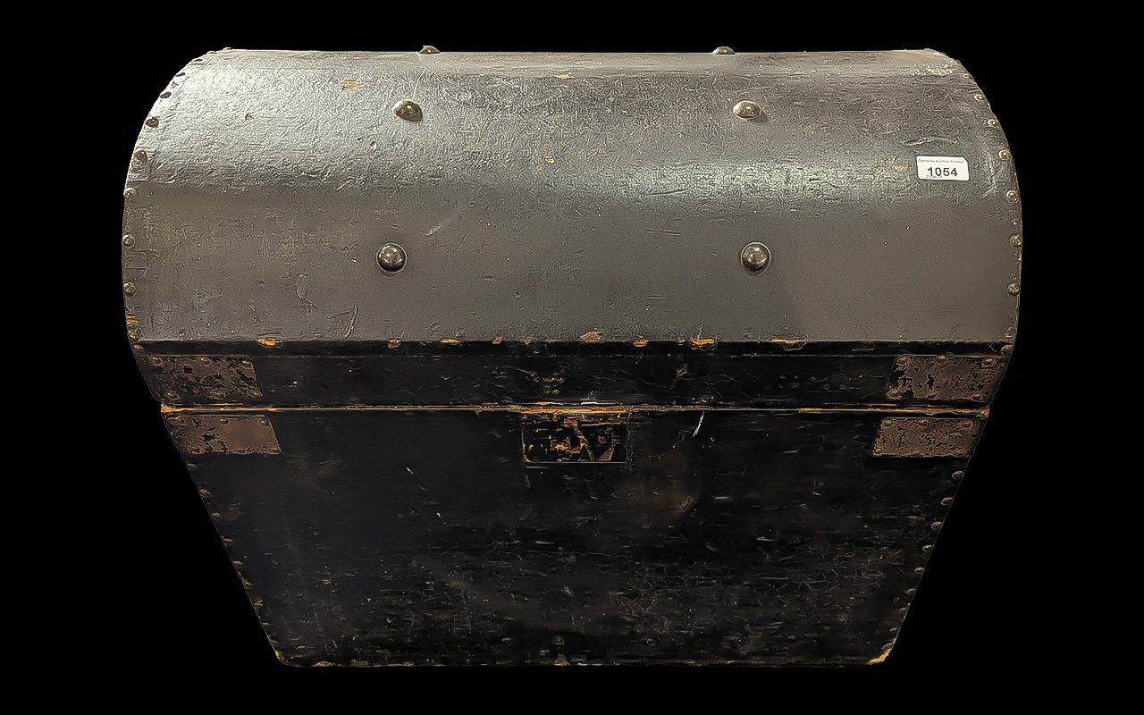 Large Vintage Black Wooden Trunk, domed and studded lid, measures 27" wide x 24" high x 19" deep.