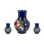 Moorcroft Tubelined Bulbous Vase 'Anemone' Design on royal blue ground with superb lustre;