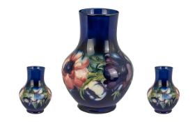 Moorcroft Tubelined Bulbous Vase 'Anemone' Design on royal blue ground with superb lustre;