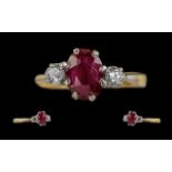 18ct Gold - Pleasing 3 Stone Ruby and Diamond Set Dress Ring.