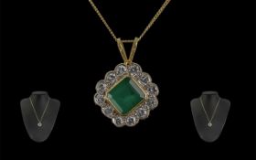 A Superb 18ct Gold Diamond and Emerald Set Pendant - Attached to a 18ct Gold Chain.