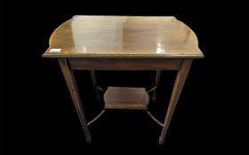Edwardian Mahogany Side Table of shaped rectangular form, raised on square tapered legs with